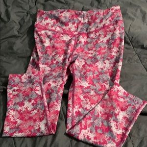 Pink Capri workout pants.